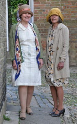 Local ladies play passers by in West Street and they love the 1930s fashion