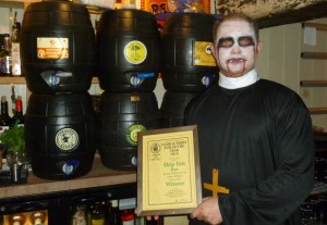 Theo shows off his CAMRA certificate as well as his Halloween outfit