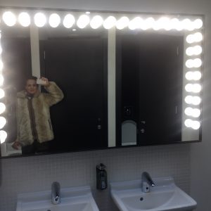 A selfie: me enjoying the carnival bulb mirror at Rye's Kino