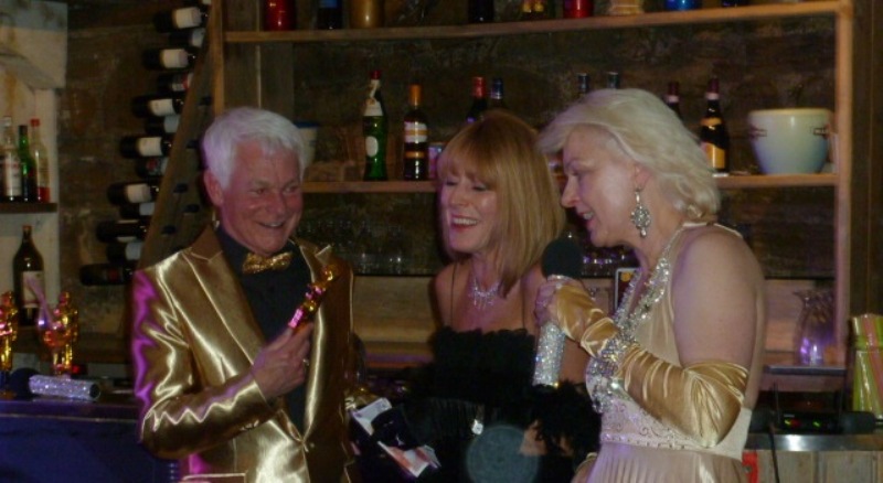 The Blings (left and right) with one of the night's winners Lyn Venn (centre)