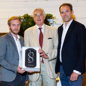 Derek Rankin (l) and Rob Pollard (r) of Jonathan Dunn Architects receiving the award from Sussex Heritage Trust president Lord Egremont (centre)