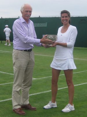 Phillipa Coates receives the winners trophy from club chairman Jonathan Jempson