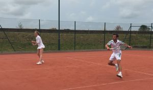 Mixed doubles winners Annie Goransson and Bruno Nikolic on the artificial clay surface