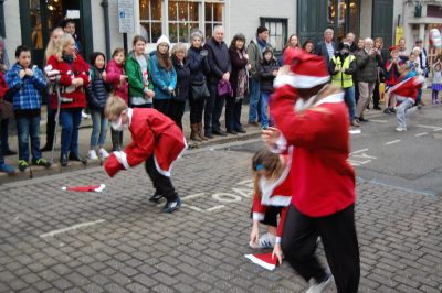 Children racing to don Santa Claus outfits 