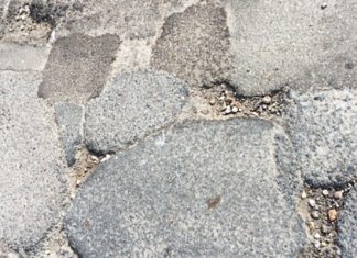 Potholes: the scales of absurdity