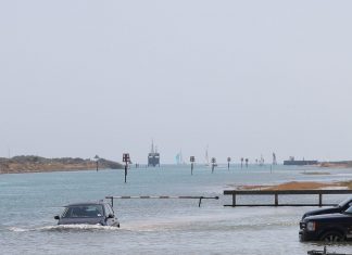 Water catches cars napping