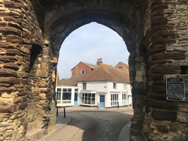 The Landgate arch frames the Outside Inn