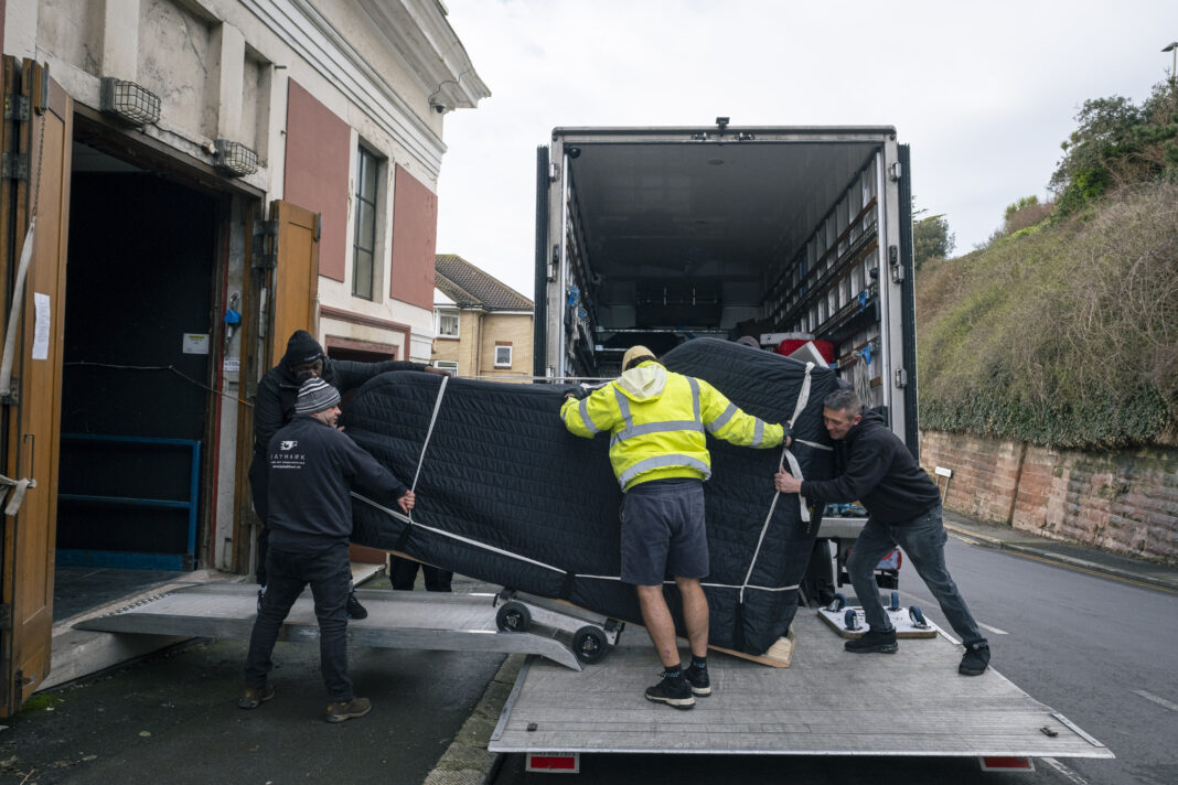 One of the Steinway model D grand pianos being loaded into the White Rock Theatre