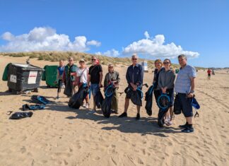 Monthly beach clean brings volunteers together