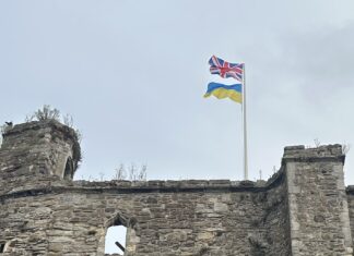 The Ukrainian flag stays up