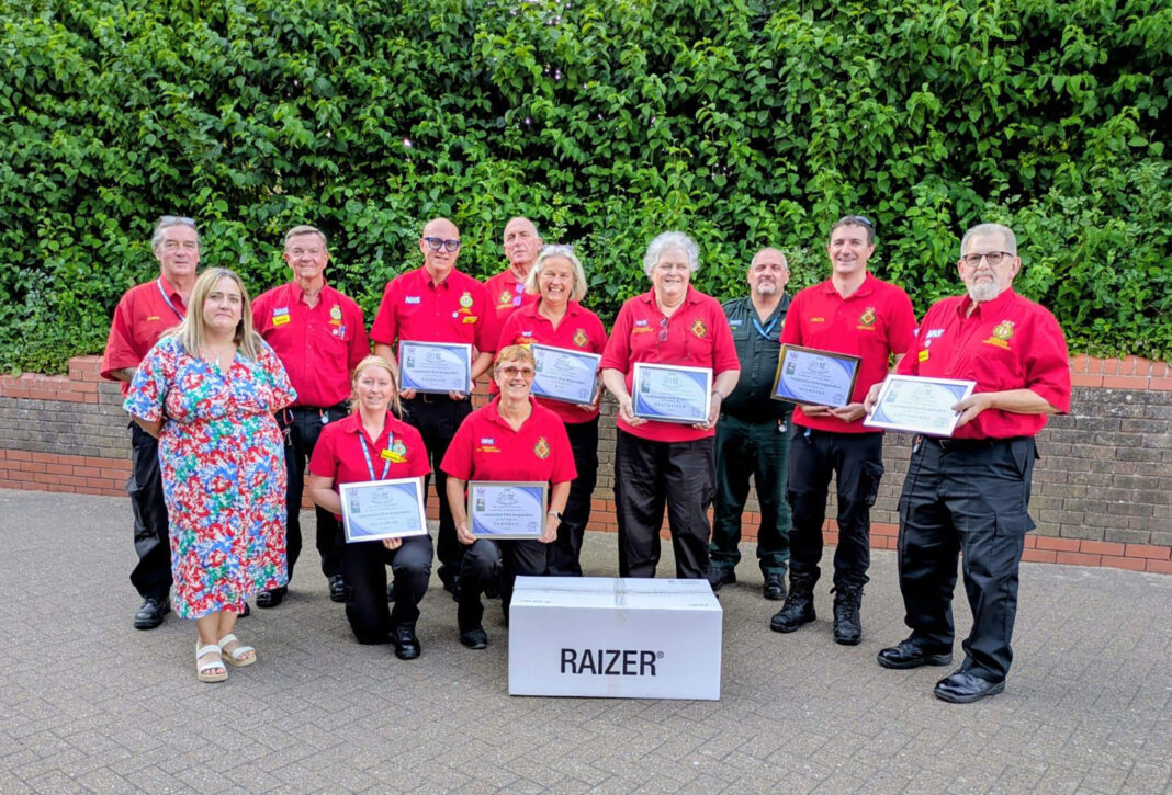 Representatives of the CFR groups in East Sussex with their framed certificate and Raizer chair
